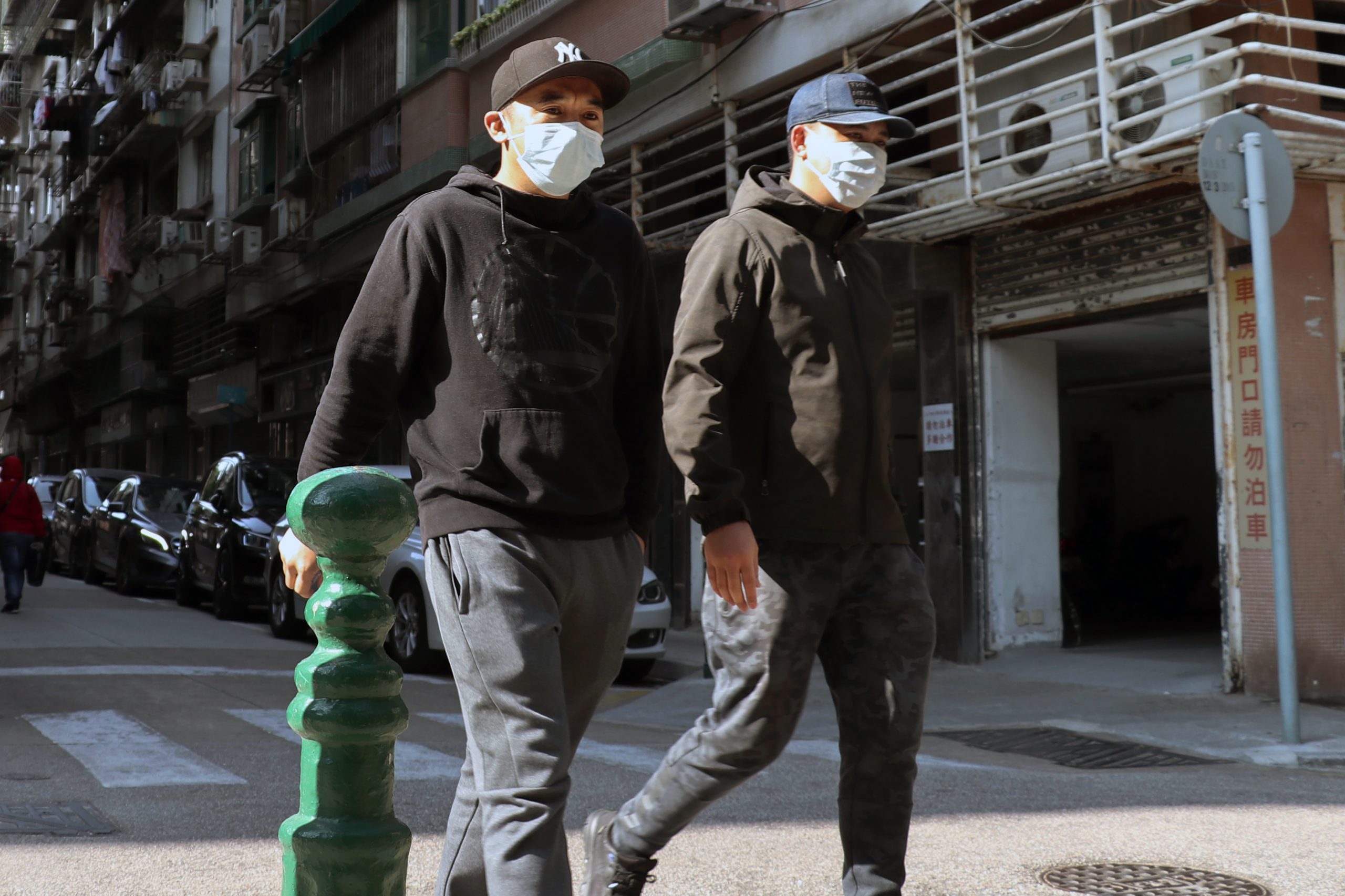 Men wearing masks in Macau during Coronavirus