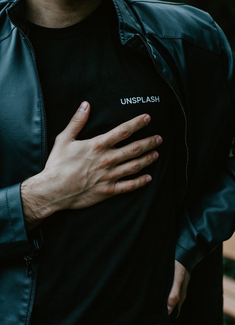 man in black adidas zip up jacket