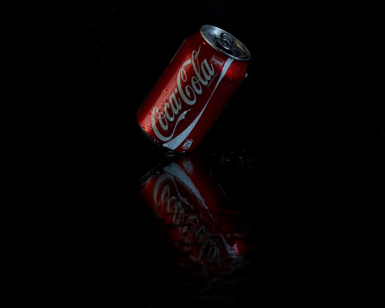 red and white Coca-cola can close-up photography